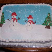 Snowmen Got idea from another cake on this board. all buttercream