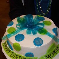 Blue, Green Poka Dot Cake This I baked, iced and made the mmf, and gelatin bow for. My friends daughter who is 11 decorated it the way she wanted for her mother. I...