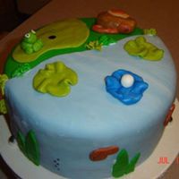 Golf Cake A cake I made for my husbands birthday. I forgot to put the 'clubs' in when I took the picture but all in all it turned out ok....
