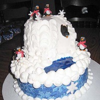 Penguin Birthday Cake Hi! I made this cake for a girl's 11th birthday. It is a white cake with nutella buttercream filling. Buttercream icing, gel pond and...