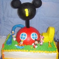 Mickey Mouse Clubhouse 1St Birthday Cake I made this for my son's 1st birthday party tomorrow night. The Clubhouse itself is styrofoam covered in satin ice. I wasn't...