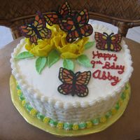 Butterfly Garden 10 inch round cake, with basketweave, gumpaste "fantasy" flowers, and hand made chocolate butterflies.