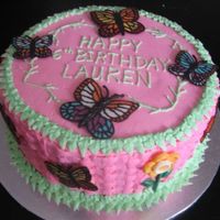 Butterfly Garden Party 12-inch round cake, with basketweave, and chocolate decorations. Used molds for the flowers and traced butterfly clip art with melted...