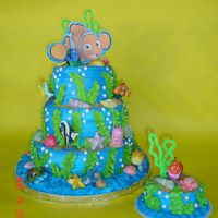 Nemo Birthday 10", 8", & 6" vanilla and chocolate cake with Oreo cookies and creme filling. Iced in crusting buttercream icing....