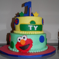 Elmo 1St Birthday Cake This was my son's 1st birthday cake. I got lots of inspiration from various cakes on CC. They are 8" and 6" rounds covered...