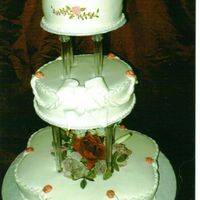 Victorian Mother's Day Cake I made this cake for a Mother's Day family reunion. The theme was Victorian. The flowers on the cake are handpainted and the tea set...