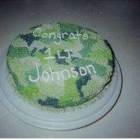 In The Army Now Army uniform cake made for a promotion. I messed up on the writing, but otherwise was pleased with the cake.