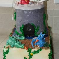 Dinosaur Cake This was a fun little 1/4 sheet cake with a castle tower made of rice crispie rounds, covered in fondant - I used a texture mat for the...
