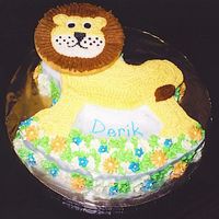 Lion Baby Shower Cake THis is a butter cake with BC icing. His head is a sugar cookie. I did this for a boy baby shower with a jungle theme.