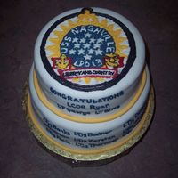 Promotion Cake This was a cake for a promotion party (wetting down) for 12 people on my husband's ship. Transfer of the ship's crest on top.