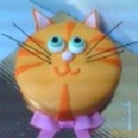 Cat Cake Yellow cake, bc icing, fondant with fondant decor. Got the idea from another CC member, but can't remember who - I'm so sorry!