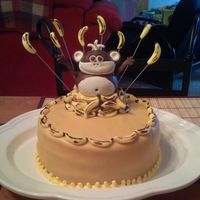 Go Bananas! White almond Sour Cream, Butter cream iced, covered in MMF, MMF hand-made and painted accents. Inspired by quite a few cakes here on CC....