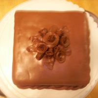 Tootsie Roll Roses Choclate Cake I am practisong doing square cakes with fondant and wanted to try tootsie roll roses. They are easy and yummy!!