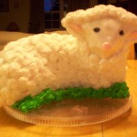 29E1Dff3.jpg Wilton stand up pan. This was my first attempt at this cake. I dowelled the head and snapped this picture literally seconds before his head...