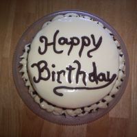 9Bcdb034.jpg This is an ice cream cake that I made for my father. It had a cool whip frosting. It was kinda hard to work with but tasted really good