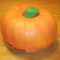 Pumpkin Cake This is a 2 yellow cakes in bundt pans. I mixed three different shades of orange to add depth in the cake the stem i mmf. I was pretty...