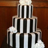 Modern Wedding Cake I did this cake for a wedding show we attended. Its a fake cake. It got alot of attention at the show and is now in the lobby of a really...