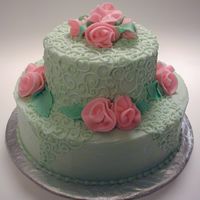 Mint Roses I made this cake for a friend of mine who was turning 21. She is really girly and she loved her sweet cake. The cake is covered in BC with...