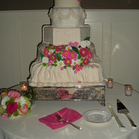 Barbara's Wedding Cake Each tier was a different shape. Two of them were styrofoam. Was a hot humid day and the second tier from the bottom- the fondant started...