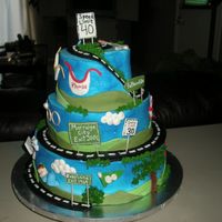 Road Of Life three layer caek that I carved the road on each layer. Got alot of ideas on here and some from customer. I put little things made of...