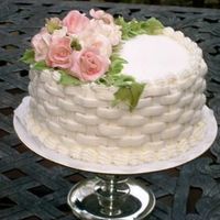 Pink Gumpaste Roses basket weave with pink roses. Hint do not do basket weave late at night! Like the roses, cake leaves some to be desired.I used sparkle...
