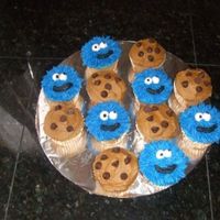 Cookie Monster Cupcakes cookie monster cupcakes to go with sesame street cake for a 2nd birthday.