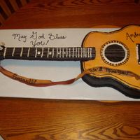 3D Guitar I did this cake for a youth pastor that was moving away. This was a "fairwell" cake. The ones that ordered it liked it so much...