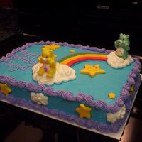 100_4989.jpg Strawberry Cake with Buttercream Icing. The rainbow and stars are MMF.