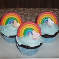 Rainbows And Butterflies Cupcakes Made 25 of these rainbows and butterfly cupcakes for a little girl's birthday. Chocolate cupcakes with buttercream icing. Fondant...