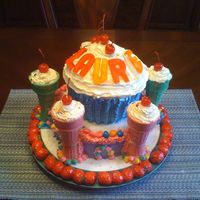Cupcake Castle My 5 yr old niece helped me decorate this one. A cupcake castle with buttercream and assorted candy decorations. She had a blast putting...