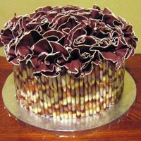 Triple Chocolate Ruffle Cake Made this cake for my brother who LOVES anything chocolate. The cake is Triple chocolate fudge cake with chocolate buttercream icing and...
