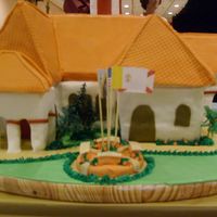 50Th Anniversary Of A Church All in fondant. Roof are in foam covered with fondant. landscape made with butter cream icing and plastic palm trees.