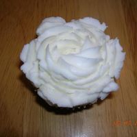 White Rose Cupcake White cupcake with white vanilla BC using the 1M tip. I was surprised how easily it made such a pretty design. I will definitely use it...