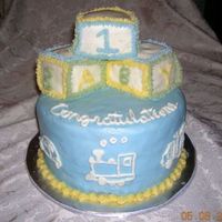 Baby Blocks Cake For Boy White double layer 8 inch rounds with sculpted blocks on top. Had a hard time covering the blocks with BC (there was a lot of icing on the...