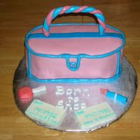 Pink And Blue Purse Cake Darn Good CC with chocolate ganache filling and strawberry MMF. Accents on cake are MMF painted with pearl dust. Handle, nail polish and...