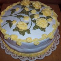 Yellow Rose Cake White Cake with Strawberry cream filling, BC icing.
