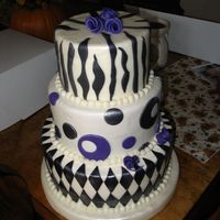 50Th B-Day Party customer saw a cake like this on cc and had to have it. she added purple instead of just blk and white. bc with fondant accents. one of my...