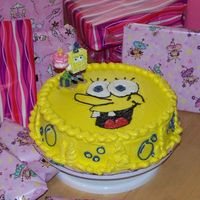 Spongebob Cake For my daughter's birthday. It's just a butter cake with buttercream icing. Bubbles on the side. And some kid at the party raked...