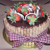 Chocolate Cake W/ Chocolate Mousse Filling I'm getting lots of requests for this cake....chocolate cake, chocolate mousse filling, ganache, pirouette cookies and choc. covered...