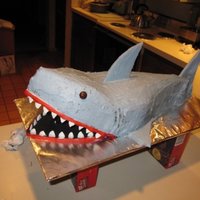 Shark Birthday I spent all day looking for suitable teeth...that was exhausting! All chocolate cake with cream on the outside and fluff filling on the...