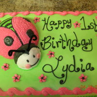 Lady Bug 1St Birthday Cake pink and green lady bug 1st birthday cake all done in buttercream icing.