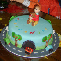 Aleksander`s Cake Three different layers of cakes (chocolate,vanilla and white cake) with chocolate filling. The cake is covered in fondant. Figures are made...