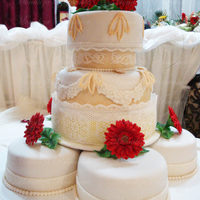 Wedding Cake With Gerberas This wedding cake I made for my cousin`s wedding. He was very happy with the cake. It took me 2 weeks to made this cake. I baked 9 cakes...