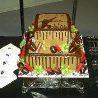 Hunting Theme Grooms Cake My first grooms cake...2 tier chocolate buttercream torted with chocolate ganache. I made modeling chocolate and cut the hunter from it...