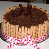 Chocolate Caramel Cake Chocolate caramel sour cream cake with caramel filling and whipped chocolate ganache. M on top is first initial of the birthday girl. Used...