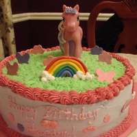 My Little Pony My Little Pony Pinkie Pie using gum paste for mane and tail in the twirl parlor play doh set. Buttercream icing with gumpaste accents.