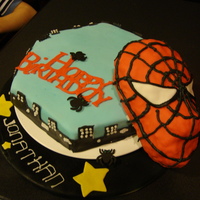 Spiderman Cake Spiderman birthday cake covered in Fondant. Spiderman's head is made out of Rice Krispies covered in fonant.