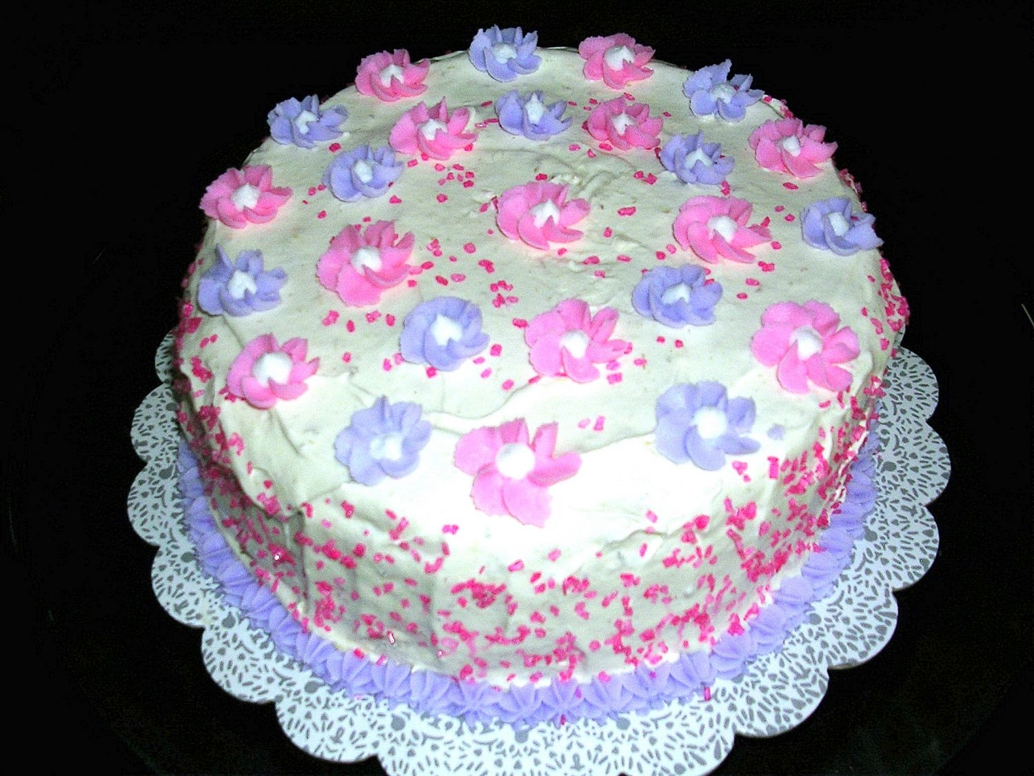 Just For Fun This was a "Just For Fun" cake for a couple of friends at work. Very simple, with a couple of flower on top, some spirnkles, and...