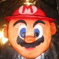 Mario.jpg Thanks you to msauer for her step by step photo and instructions. My cake was changed a bit in size and my Mario looks a bit sun burnt. I&#...