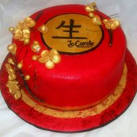 Happy Birthday Jo Carole 10" Vanilla cake torted with strawberries. I used mmf tinted red with Americolors Super Red. I sponge painted over the whole cake with...